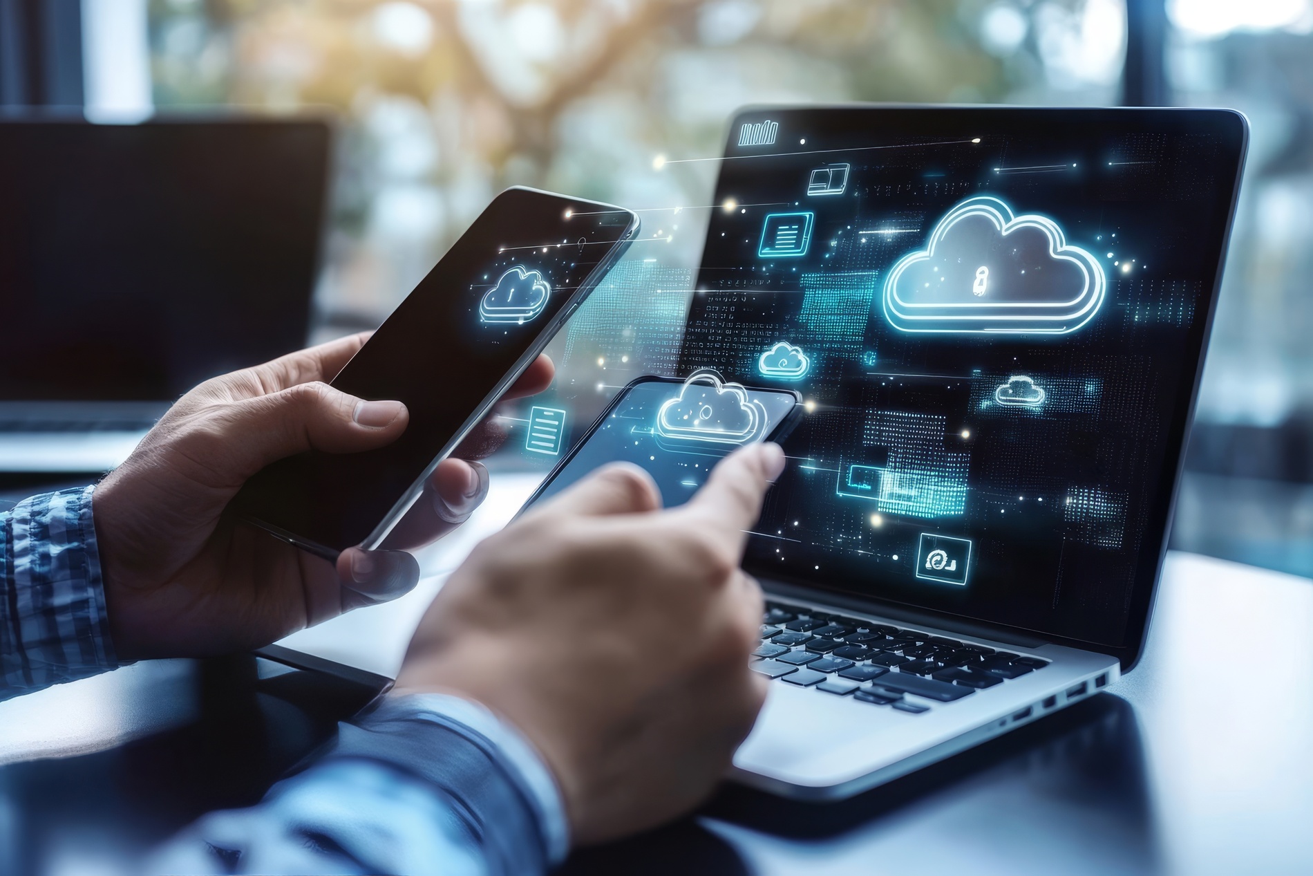 Graficzne przedstawienie przenoszenia danych między telefonami i komputerem